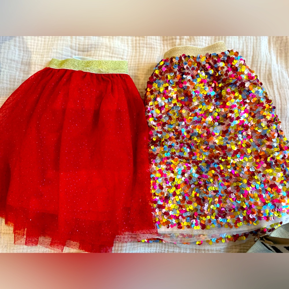 Two tutus and one dress all fit like 6/7 girls